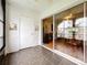 Sunroom with access to exterior and tiled floors at 7701 Starkey Rd # 324, Seminole, FL 33777