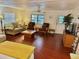 Spacious living room with comfortable seating and a large flat-screen TV at 9790 66Th N St # 208, Pinellas Park, FL 33782