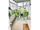 Relaxing screened porch with seating for four, perfect for outdoor enjoyment at 9790 66Th N St # 208, Pinellas Park, FL 33782