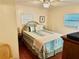 Guest bedroom with a double bed and beach-themed decor at 9790 66Th N St # 208, Pinellas Park, FL 33782