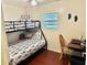 Bedroom with a bunk bed and a small workspace at 9790 66Th N St # 208, Pinellas Park, FL 33782