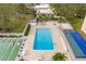 Aerial view of a pool and shuffleboard court at 11485 Oakhurst Rd # 322, Largo, FL 33774