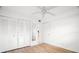 Bedroom features closet space and wood flooring at 11485 Oakhurst Rd # 322, Largo, FL 33774