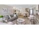 Open concept living room, dining, and kitchen area at 4351 Cloud Hopper Way, Lutz, FL 33559