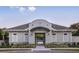 Community pool gate entrance with landscaping at 4351 Cloud Hopper Way, Lutz, FL 33559
