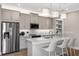 Modern kitchen with stainless steel appliances and island at 4351 Cloud Hopper Way, Lutz, FL 33559
