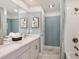 Light and airy bathroom with a double vanity and a bathtub at 4351 Cloud Hopper Way, Lutz, FL 33559