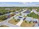 Wide aerial view of the home and surrounding neighborhood at 7511 Tyson Dr, Port Richey, FL 34668