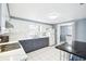 Modern kitchen with updated cabinets, quartz countertops, and stainless steel appliances at 7511 Tyson Dr, Port Richey, FL 34668