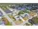 Aerial view of a single Gathering home with solar panels at 7511 Tyson Dr, Port Richey, FL 34668