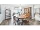 Bright dining room featuring an oval table with wooden chairs and a large hutch at 7511 Tyson Dr, Port Richey, FL 34668