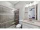 Modern bathroom with a large shower and updated vanity at 8520 Grand Alberato Rd, Tampa, FL 33647