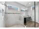 Spa-like bathroom with a large walk-in shower and built-in bench at 8520 Grand Alberato Rd, Tampa, FL 33647