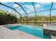 Enclosed pool and spa, screened patio at 8520 Grand Alberato Rd, Tampa, FL 33647