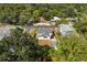 Aerial view of a recently renovated home in a quiet, tree-lined neighborhood at 1001 E New Orleans Ave, Tampa, FL 33603