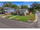 Newly renovated home with a fenced yard, driveway, and located on a corner lot at 1001 E New Orleans Ave, Tampa, FL 33603
