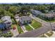 Aerial view of a renovated home with a driveway and fenced yard at 1001 E New Orleans Ave, Tampa, FL 33603