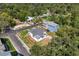 Aerial view of a renovated home with a fenced yard in a residential neighborhood at 1001 E New Orleans Ave, Tampa, FL 33603