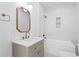 Elegant bathroom with white penny tile and bathtub at 1001 E New Orleans Ave, Tampa, FL 33603