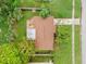 Overhead view of the house, showing its roofline and yard at 1005 Greenleaf Way, Tarpon Springs, FL 34689