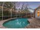 Screened pool and spa with a spacious patio area at 11832 Lancashire Dr, Tampa, FL 33626