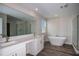 Elegant bathroom with double vanity, soaking tub, and walk-in shower at 12124 Cattleside Dr, Riverview, FL 33579