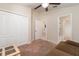 Bedroom with ceiling fan and door to bathroom at 12320 Ballentrae Forest Dr, Riverview, FL 33579