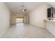 Spacious living room with tile floors and pool view at 12320 Ballentrae Forest Dr, Riverview, FL 33579