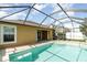 Relax in the screened pool and spacious patio area at 12320 Ballentrae Forest Dr, Riverview, FL 33579