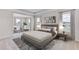 Main bedroom with sitting area and large windows offering abundant natural light at 16021` 7Th E Ave, Bradenton, FL 34212