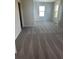 Spacious bedroom with neutral carpet, and dual windows allowing for natural light at 16021` 7Th E Ave, Bradenton, FL 34212