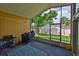 Enclosed patio provides an outdoor living space with a grill at 311 Sugar Creek Dr, Plant City, FL 33563
