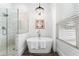 Relaxing bathroom with soaking tub and walk-in shower at 3506 N Arlington Ave, Tampa, FL 33603