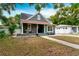 Beautiful craftsman home featuring a cozy front porch and inviting curb appeal at 3506 N Arlington Ave, Tampa, FL 33603