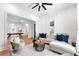 Bright living room with hardwood floors and a comfortable seating area at 3506 N Arlington Ave, Tampa, FL 33603