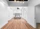 Bright bedroom with hardwood floors and a large bed at 3506 N Arlington Ave, Tampa, FL 33603