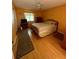 Bedroom with light wood flooring, ceiling fan, and a double bed at 4215 E Bay Dr # 1013B, Clearwater, FL 33764
