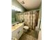 Clean bathroom with shower/tub combo and updated vanity at 4215 E Bay Dr # 1013B, Clearwater, FL 33764
