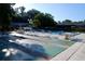 Community pool and shuffleboard courts for recreation at 4215 E Bay Dr # 1013B, Clearwater, FL 33764