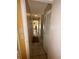 Hallway with tiled flooring, leading to bedrooms and other rooms at 4215 E Bay Dr # 1013B, Clearwater, FL 33764