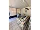 Relaxing Florida room with tiled floors and comfy seating at 4215 E Bay Dr # 1013B, Clearwater, FL 33764
