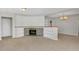 Living room with a stone fireplace and built-in shelving at 4601 8Th N Ave, St Petersburg, FL 33713