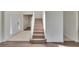 Elegant staircase leading to the upper level at 4716 Barnstead Dr, Riverview, FL 33578