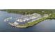 Aerial view of a marina with many boats and lush vegetation at 4717 W Mccoy St # 13, Tampa, FL 33616