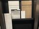 Selection of kitchen and flooring materials including cabinetry and tile at 5015 Stoney Point Gln, Lakewood Ranch, FL 34211