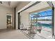 Relaxing pool and patio area with sliding glass doors from the home at 5015 Stoney Point Gln, Lakewood Ranch, FL 34211