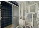 Bathroom with blue tile shower and ongoing renovations at 5419 Denver Ne St, St Petersburg, FL 33703