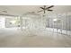 Open-concept living space under renovation, with exposed framing at 5419 Denver Ne St, St Petersburg, FL 33703