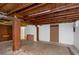 Unfinished basement with exposed beams and concrete floor at 615 16Th Nw St, Largo, FL 33770
