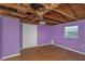 Empty purple bedroom with damaged ceiling at 615 16Th Nw St, Largo, FL 33770